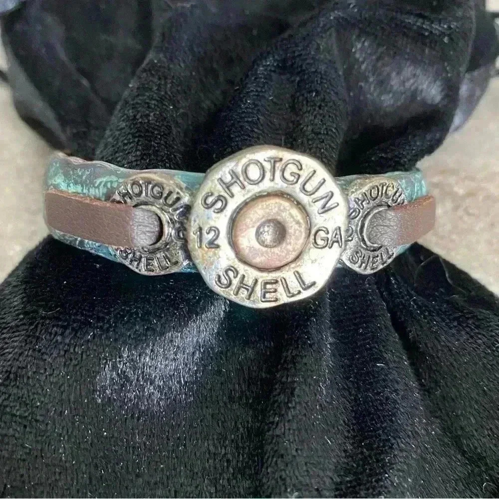 Western 12 gauge shell casing hammered metal base leather adjustable strap